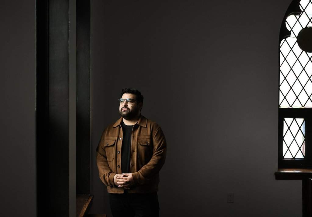 Pastor Bernaby Quevedo poses at his church in Montreal, Tuesday, Nov. 25, 2025. THE CANADIAN PRESS/Graham Hughes.