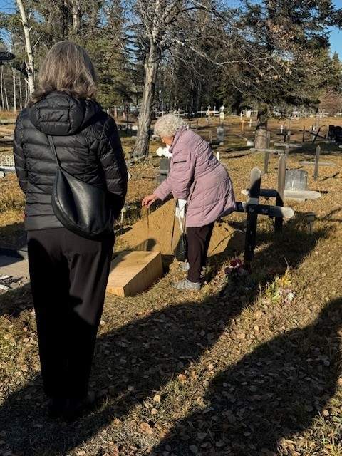 Delphine Beaulieu lays to rest her sister Alma who died at St. Joseph’s Residential School at Fort Resolution, N.W.T. in 1944. Alma was exhumed from her grave near the school and re-interred next to her mother in Fort Smith, N.W.T. on Oct. 20, 2025