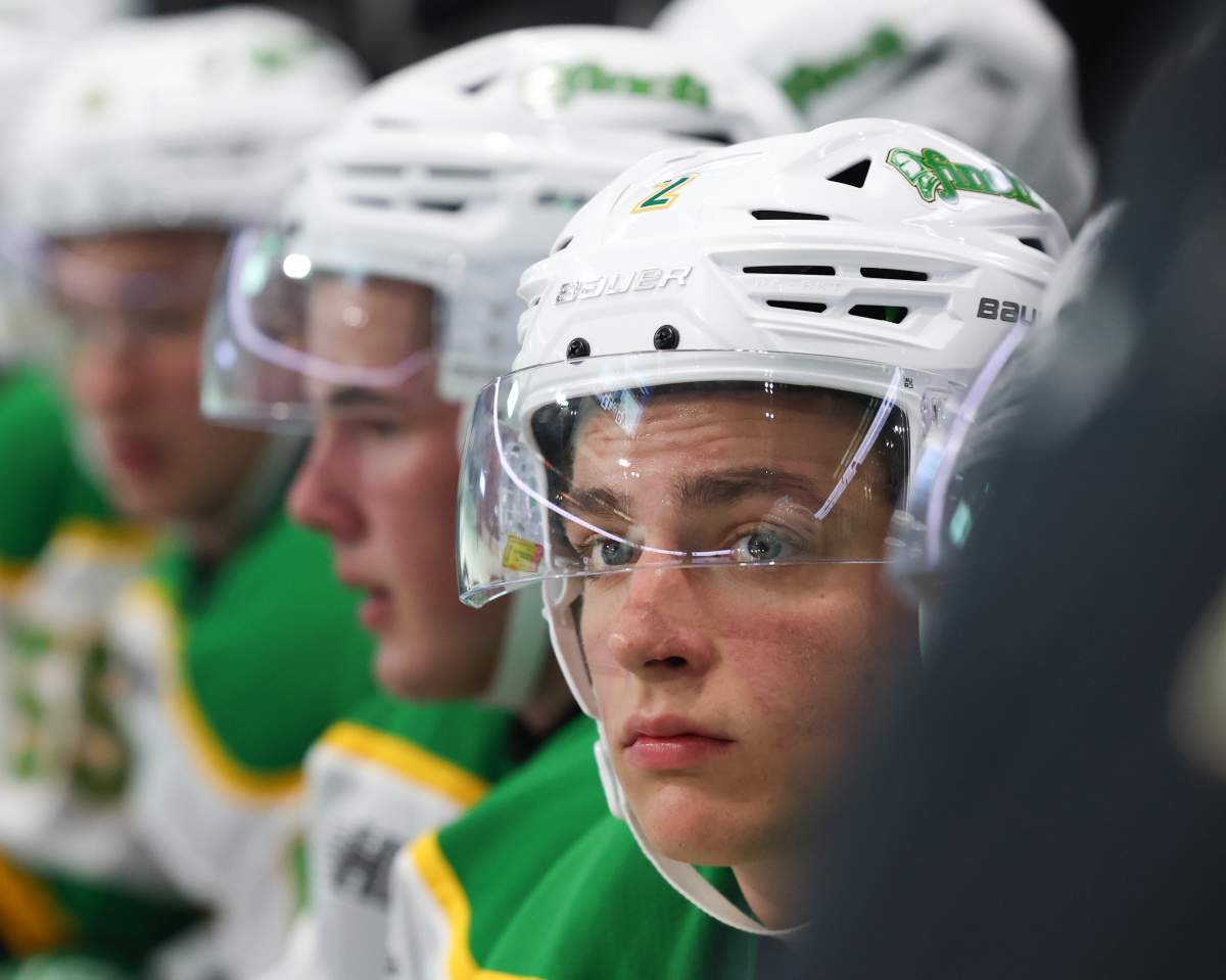 London Knights defenceman Henry Brzustewicz looks on from the Knights bench.