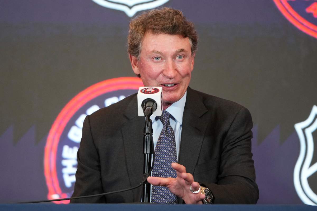 Former NHL player Wayne Gretzky speaking during a press conference after an NHL hockey game in which Washington Capitals Alex Ovechkin tied Gretzky's NHL career goals record of 894th goals, Friday, April 4, 2025, in Washington.
