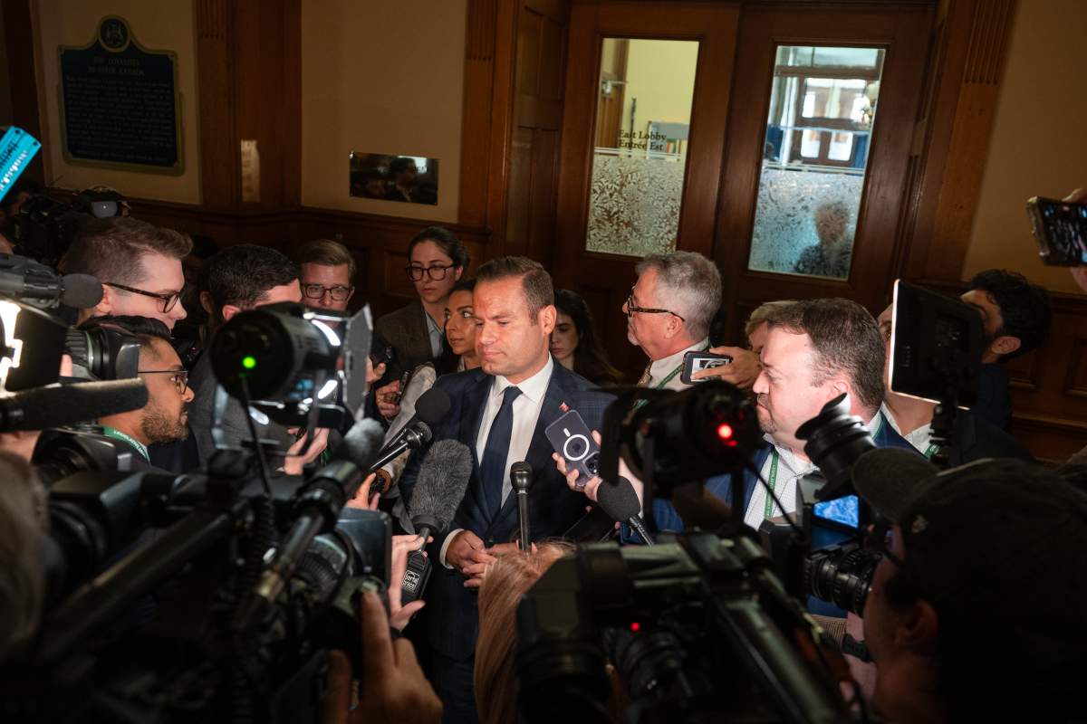 Ontario Minister of Labour, Immigration, Training and Skills Development David Piccini speaks to media at Queen’s Park in Toronto, on Monday, Oct. 20, 2025. 