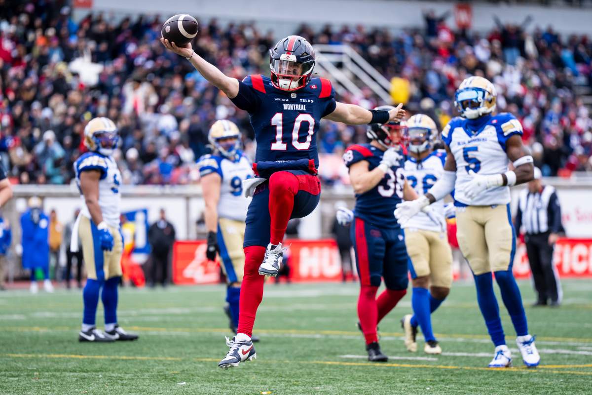 Montreal Alouettes' quarterback Davis Alexander (10) celebrates as he scores during first half Eastern semi-final action against the Winnipeg Blue Bombers, in Montreal on Saturday, Nov. 1, 2025. THE CANADIAN PRESS/Christopher Katsarov.