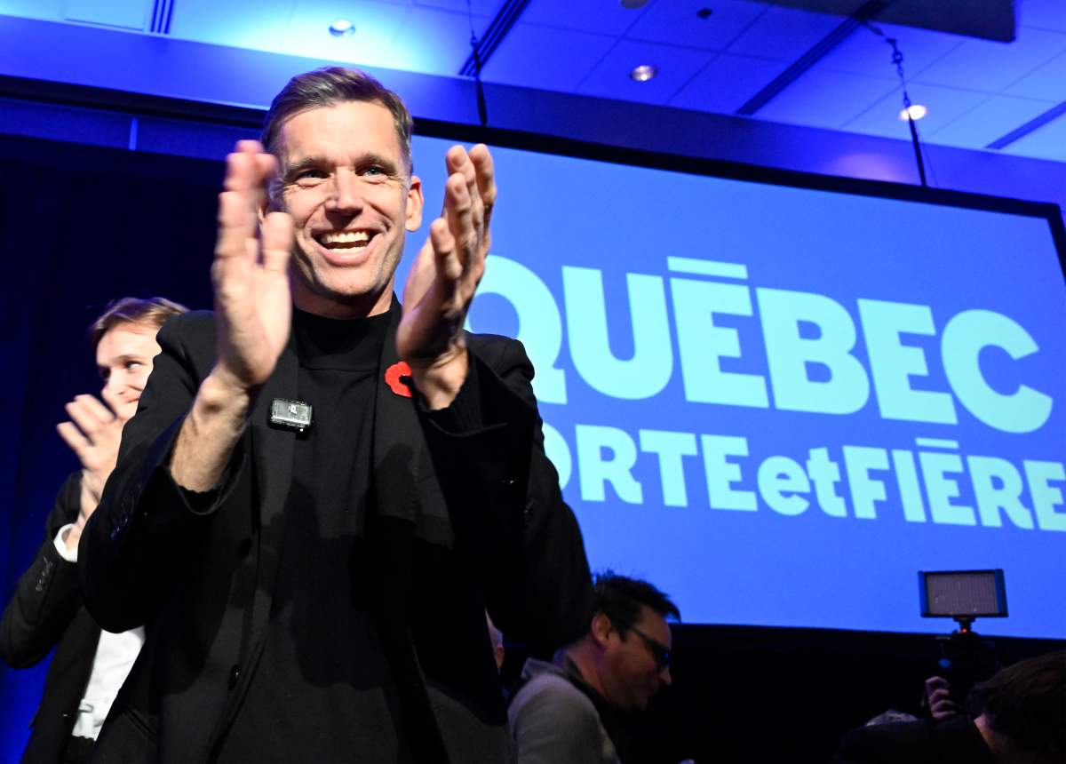 Bruno Marchand reacts to his re-election as mayor of Quebec City during celebrations in Quebec City, Sunday, Nov. 2, 2025.