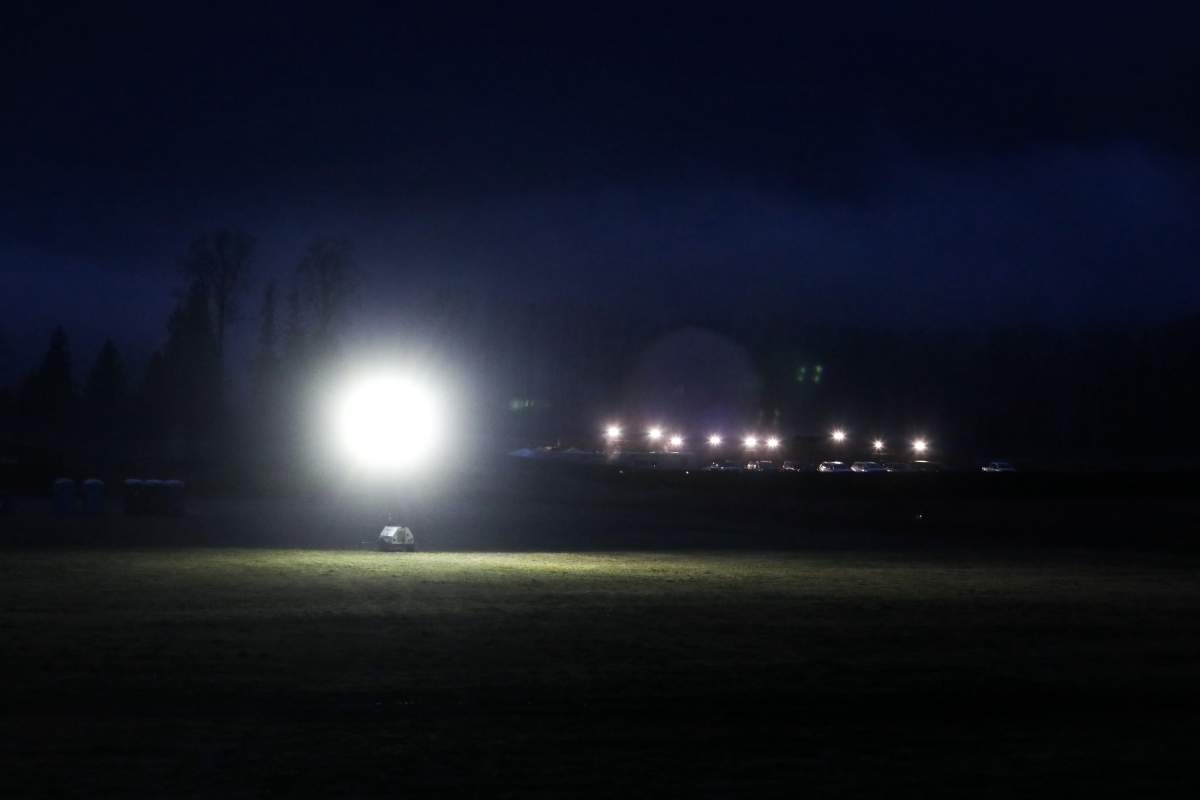Flood lights illuminate a cull enclosure, where dozens of ostriches were corralled, near the Universal Ostrich Farms in Edgewood, B.C., on Thursday, Nov. 6, 2025. Earlier in the day, the Supreme Court of Canada declined to hear the farm’s appeal against an order to cull more than 300 of its ostriches.