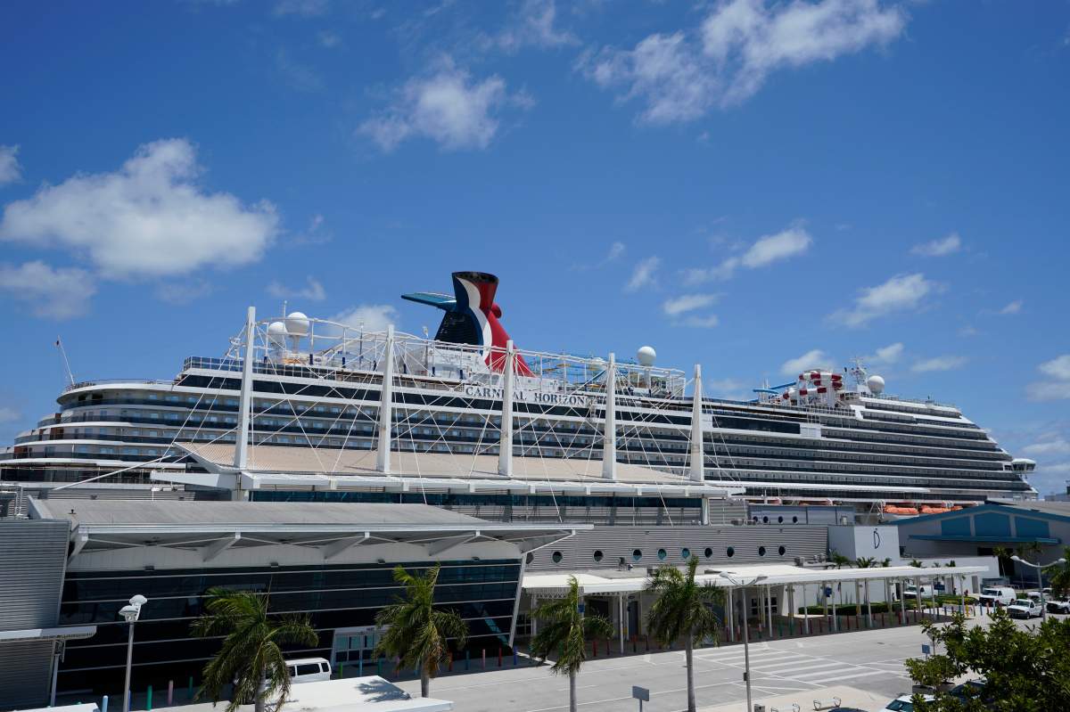FILE - Carnival Cruise Line's Carnival Horizon cruise ship is shown docked in Miami, FL. on Friday, April 9, 2021.