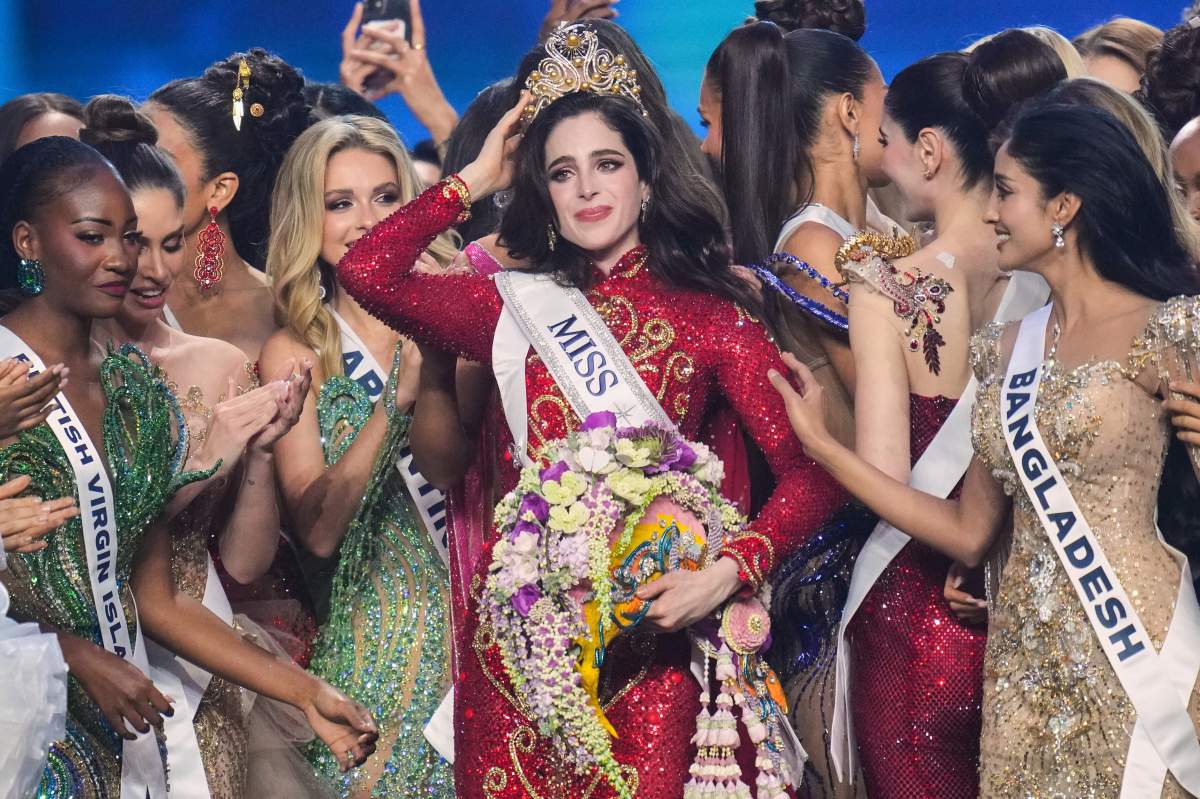 Miss Mexico Fatima Bosch, centre, is celebrated by other contesters after winning the 2025 Miss Universe pageant in Nonthaburi, north of Bangkok, Thailand, Nov. 21, 2025.