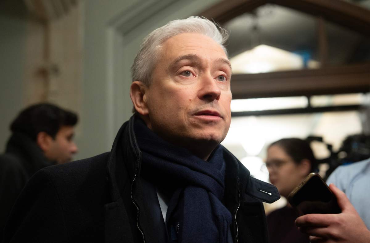 Minister of Finance and National Revenue François-Philippe Champagne speaks with reporters before caucus on Parliament Hill in Ottawa on Nov. 19, 2025. THE CANADIAN PRESS/Adrian Wyld
