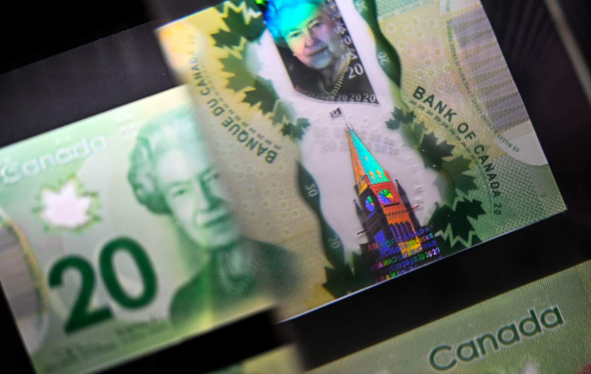 More than half of Canadians (54 per cent) report struggling to keep up with financial commitments, a survey by the Office of the Superintendent of Bankruptcy (OSB) and the Canadian Association of Insolvency and Restructuring Professionals (CAIRP) released on Tuesday said. THE CANADIAN PRESS/Justin Tang.