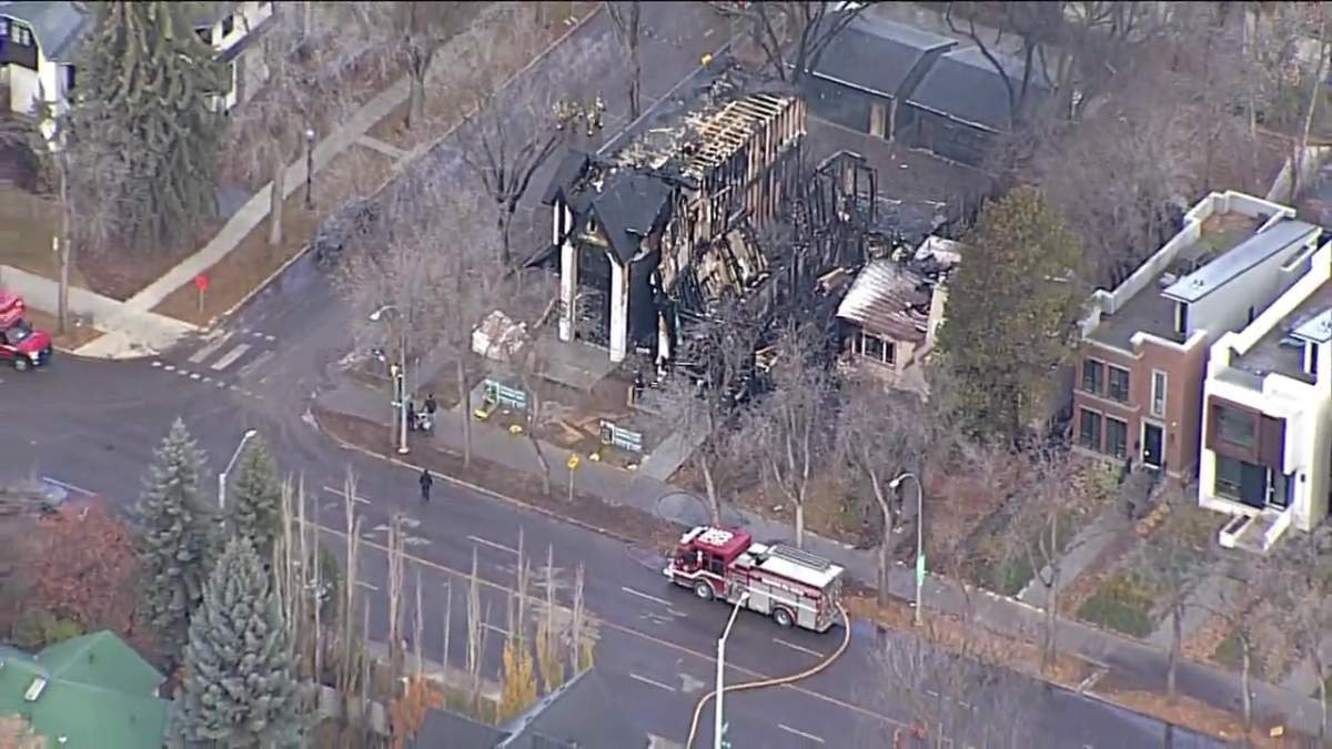 Two skinny infill homes and a neighbouring bungalow near 102 Avenue and 133 Street in the Glenora neighbourhood were damaged in a fire on Sunday, Nov. 2, 2025.