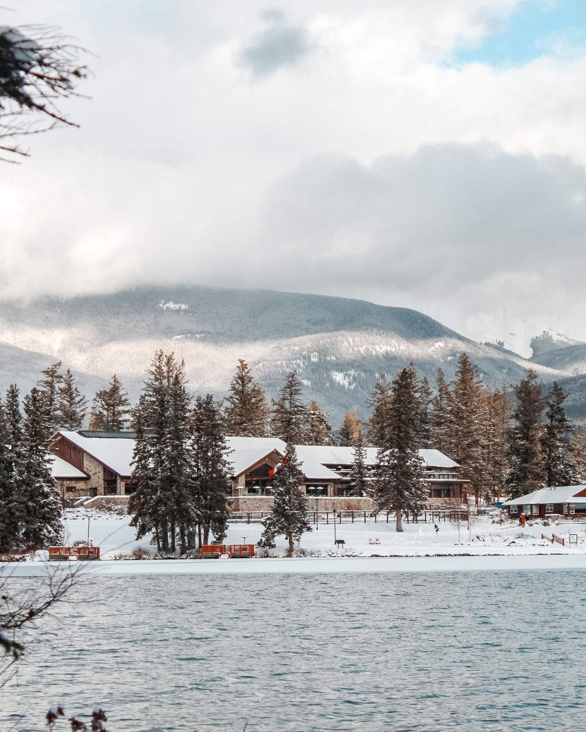 The Fairmont Jasper Park Lodge in early winter, before Lac Beauvert has frozen.
