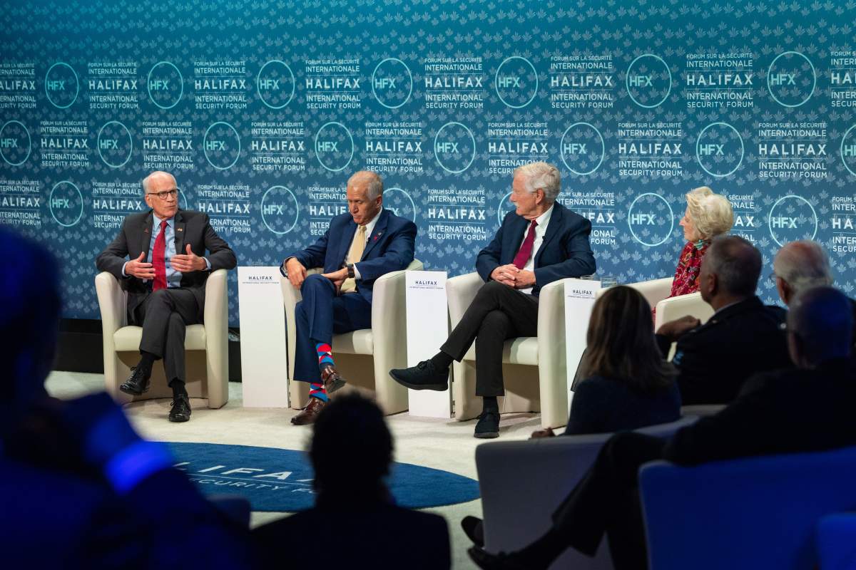 Senator Peter Welch, of Vermont, left to right, Senator Thom Tillis, of North Carolina, Senator Angus King, of Maine and moderator congresswoman Jane Harman take part in the Halifax International Security Forum, Saturday, November 22, 2025.