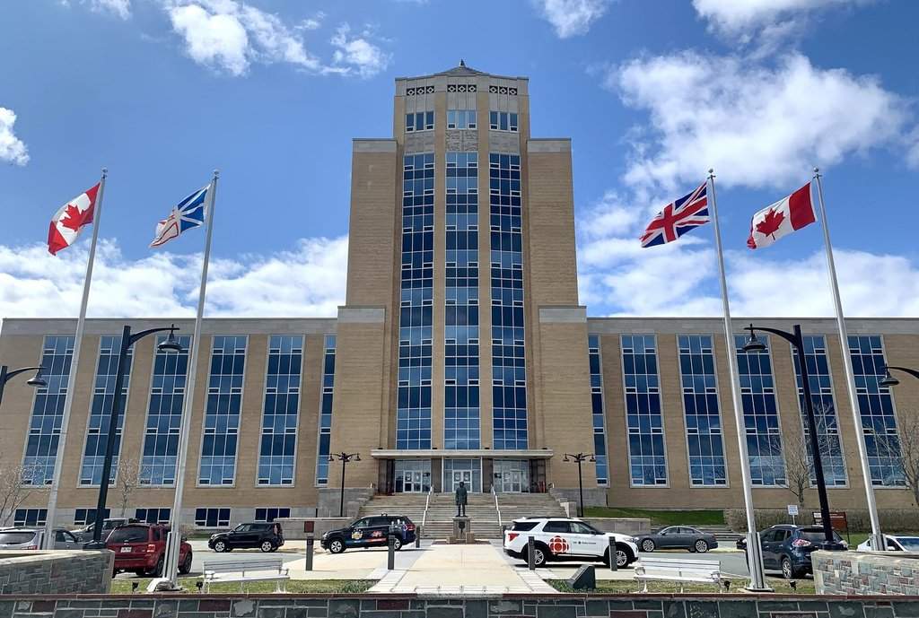 A statue of John Cabot stares out to sea from the foot of the steps of Newfoundland and Labrador's provincial legislature building, in St. John's, Aug. 29, 2021. THE CANADIAN PRESS/Sarah Smellie.