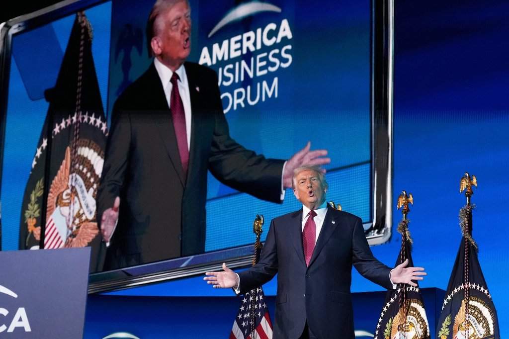 FILE - U.S. President Donald Trump arrives to speak to the America Business Forum Miami, at the Kaseya Center, Wednesday, Nov. 5, 2025, in Miami. (AP Photo/Jacquelyn Martin).