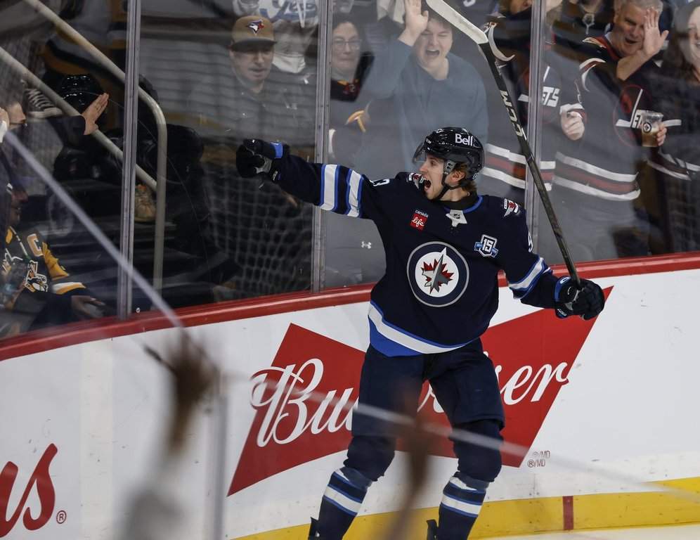Winnipeg Jets' Brad Lambert (93) celebrates his goal against the Pittsburgh Penguins during first period NHL action in Winnipeg, Nov. 1, 2025. THE CANADIAN PRESS/John Woods.