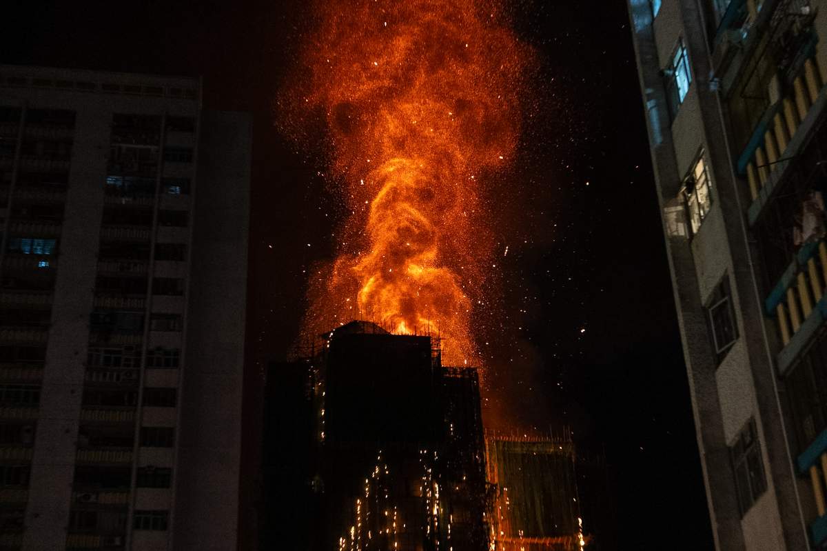 Flames engulf a building after a fire broke out at Wang Fuk Court, a residential estate in the Tai Po district of Hong Kong's New Territories, Wednesday, Nov. 26 2025.