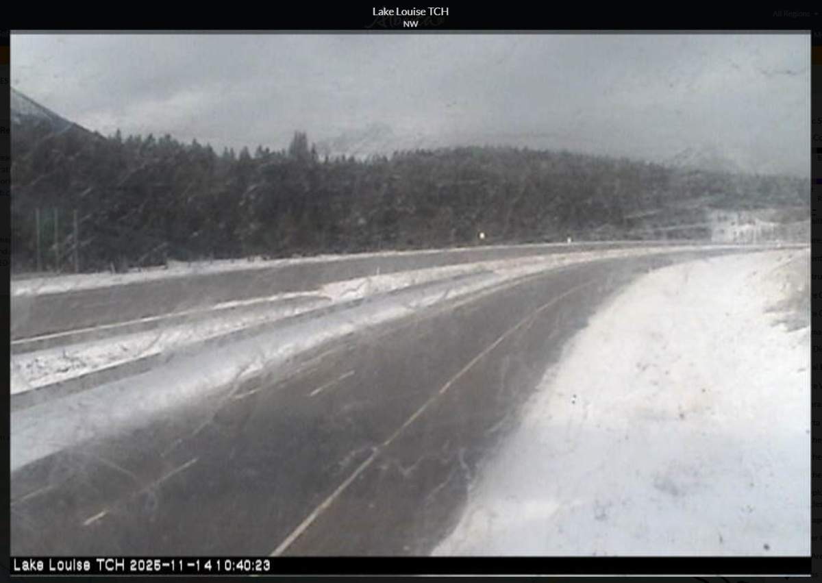 An image taken from a highway camera located just north of Lake Louise on Friday shows snow and ice along the highway.