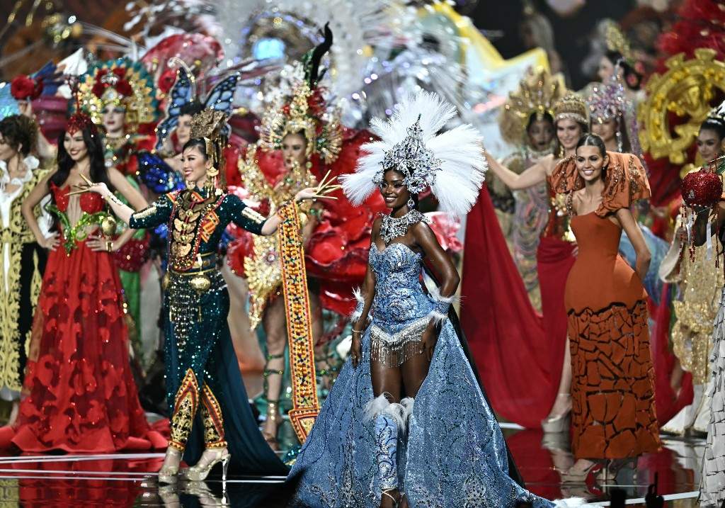 Miss Angola Maria Da Cunha (front R) walks on stage with other contestants during the 2025 Miss Universe national costume presentation in Nonthaburi, north of Bangkok, on Nov. 19, 2025.