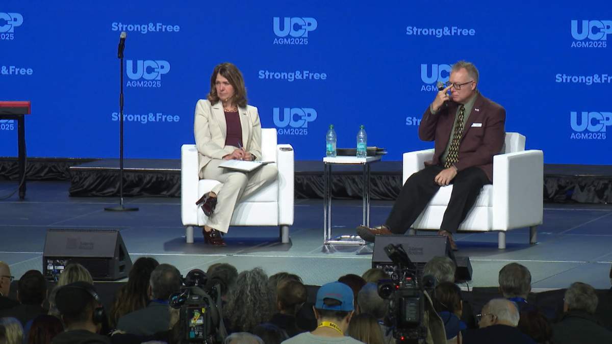 Alberta Premier Danielle Smith takes part in a question and answer session with party members at the UCP AGM in Edmonton in November 2025.