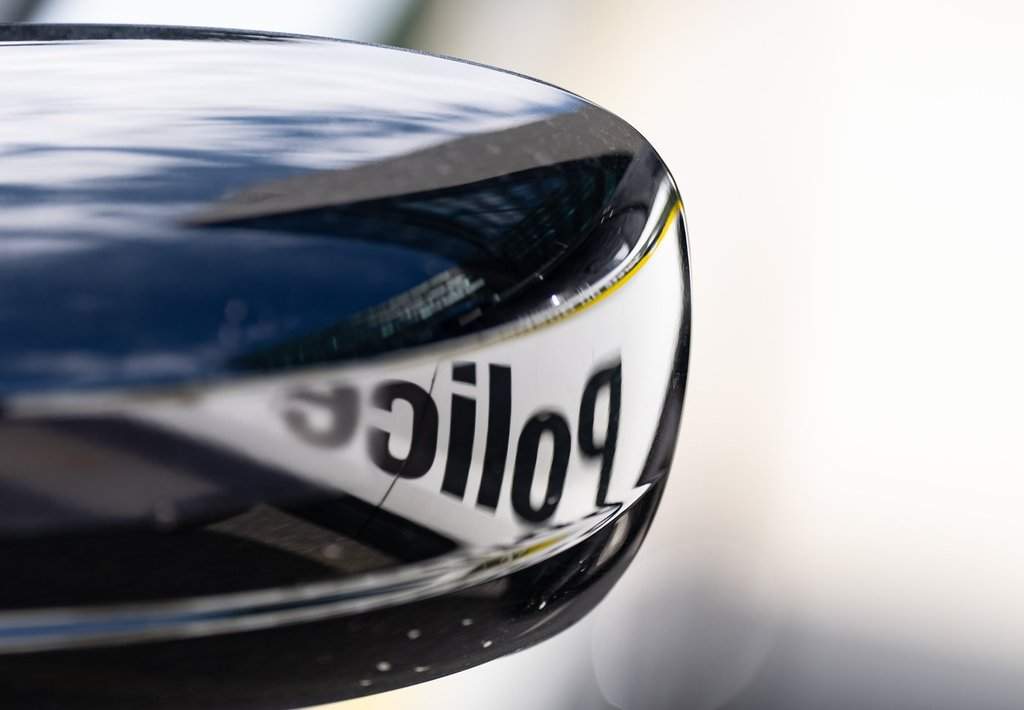 A Surete du Quebec police logo is reflected on a vehicle in Montreal, Tuesday, Sept. 10, 2024. THE CANADIAN PRESS/Christinne Muschi.