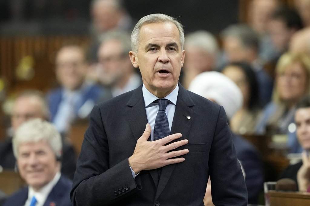Prime Minister Mark Carney rises during Question Period on Parliament Hill in Ottawa, Tuesday, Nov. 25, 2025. THE CANADIAN PRESS/Adrian Wyld.