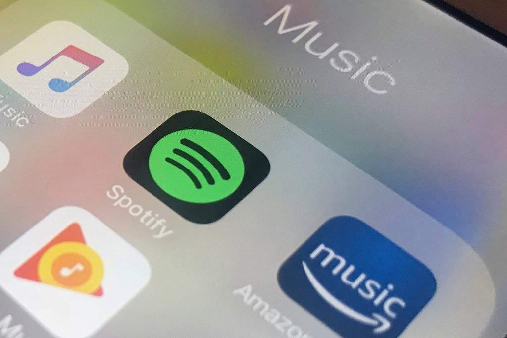 FILE - Music streaming apps are shown on cellphone in New York. (AP Photo/Jenny Kane, File).