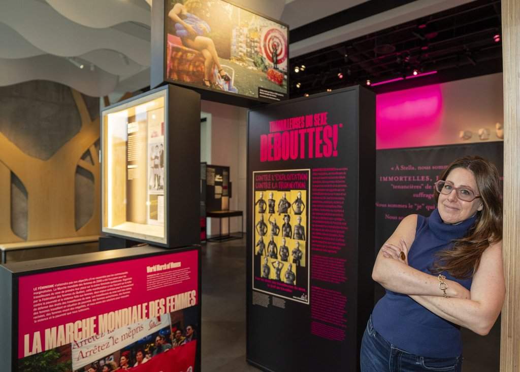 Jenn Clamen, mobilization and communications coordinator at Stella, a sex workers' rights organization, poses in their new exhibit called Stella, l’amie de Maimie, in Montreal on Tuesday, Oct. 21, 2025. THE CANADIAN PRESS/Christinne Muschi.