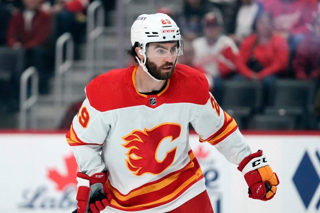 FILE - Calgary Flames center Dillon Dube (29) skates against the Detroit Red Wings in the first period of an NHL hockey game Sunday, Oct. 22, 2023, in Detroit. (AP Photo/Paul Sancya, File).