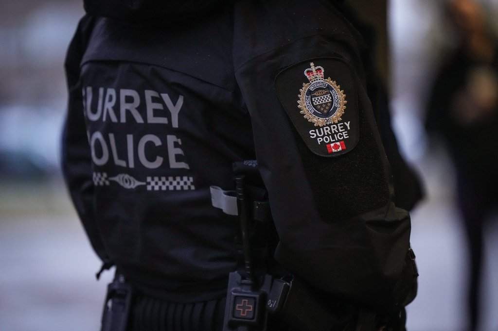 A Surrey police department logo is seen on an officer's jacket in Surrey, B.C., Monday, Oct. 31, 2022. 