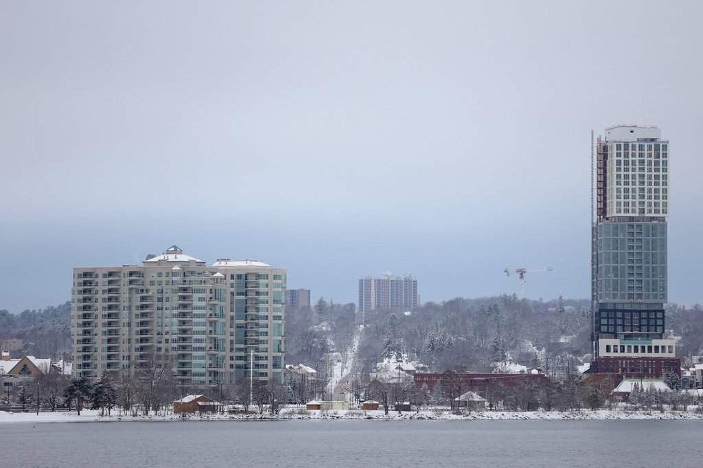 Snowbanks line a Barrie, Ont., street as crews continue round-the-clock snow removal during a prolonged significant weather event.