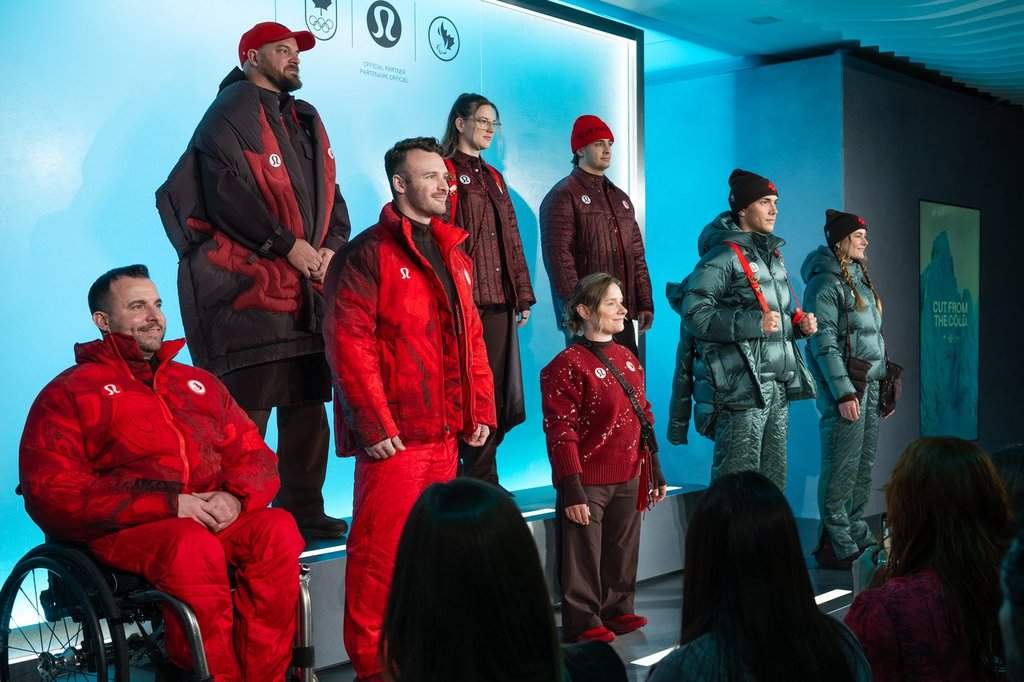 Athletes model Lululemon’s new Team Canada uniforms for the Milano Cortina 2026 Winter Olympics, in Toronto, Tuesday, Nov. 18, 2025.