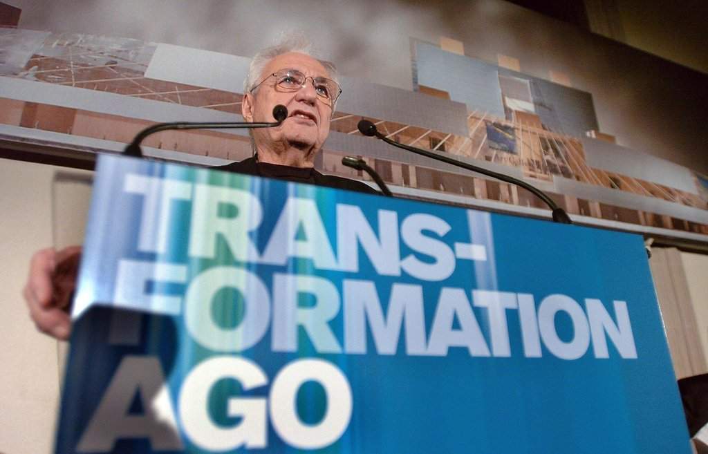 Architect Frank Gehry speaks during the unveiling of his planned redesign for the Art Gallery of Ontario in Toronto,  Wednesday Jan. 28, 2004.  (CP PHOTO/Aaron Harris).