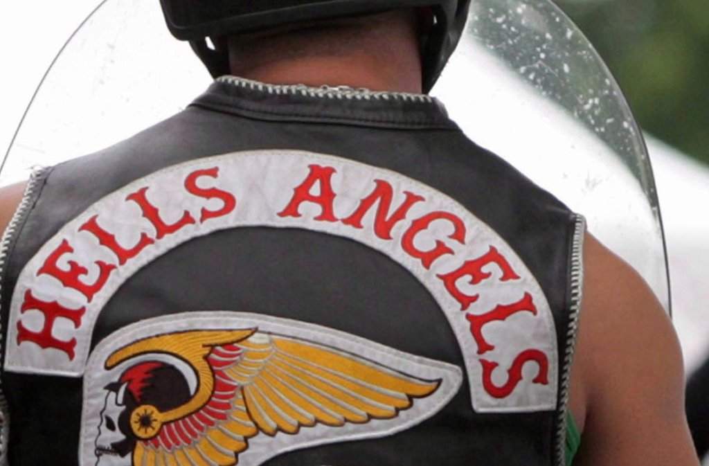 Members of the Hells Angels arrive at a property in Langley, B.C., on July 25, 2008.