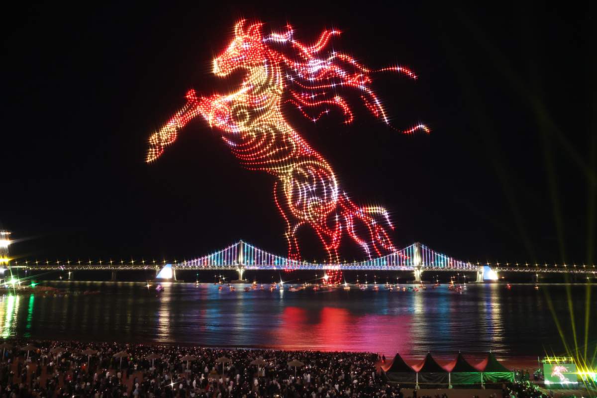 Drones light up the night sky to celebrate the New Year in Busan, South Korea, early Thursday, Jan. 1, 2026.