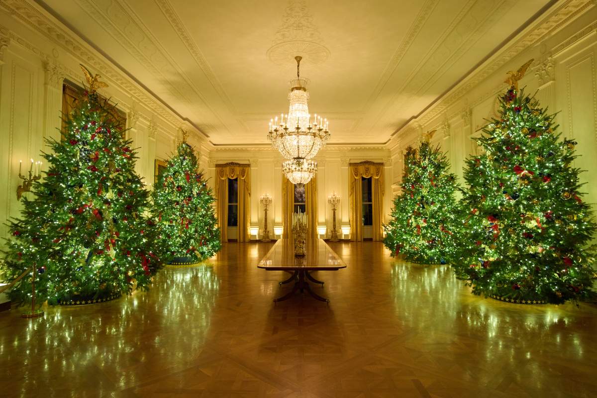 Christmas trees decorate the East Room of the White House during a press preview of the Christmas decorations 'Home is Where the Heart Is,' Monday, Dec. 1, 2025, in Washington.