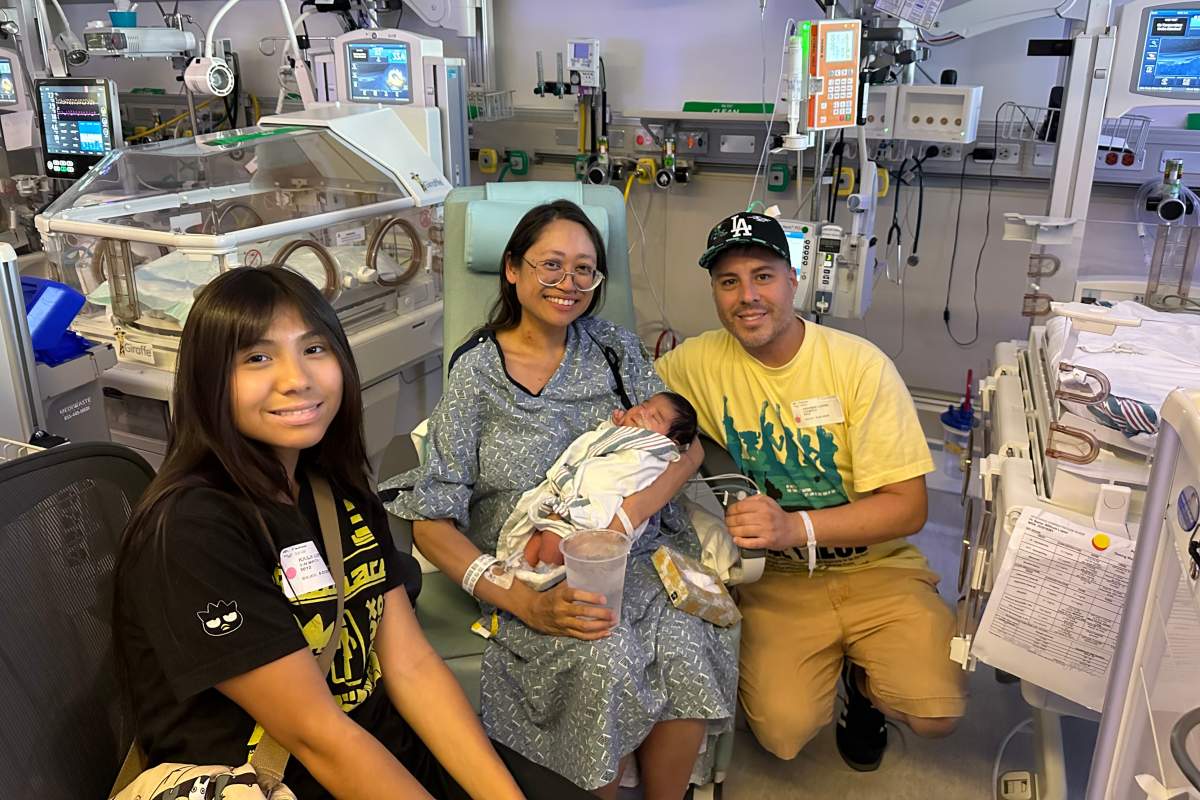 This photo, provided by the family, shows, from left, Kaila, Suze, Ryu and Andrew Lopez at Cedars-Sinai Hospital in Los Angeles in August 2025.