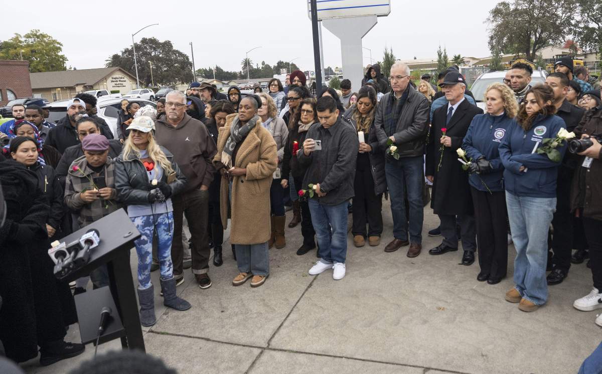 Community members mourn at a vigil in Stockton, California, on Sunday, Nov. 30, 2025, for the four people killed and 11 injured in a mass shooting the night before.