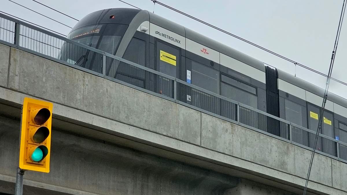 The Metrolinx Eglinton Crosstown LRT vehicle is seen on a transit designated overpass in Toronto, Aug. 16, 2024. 