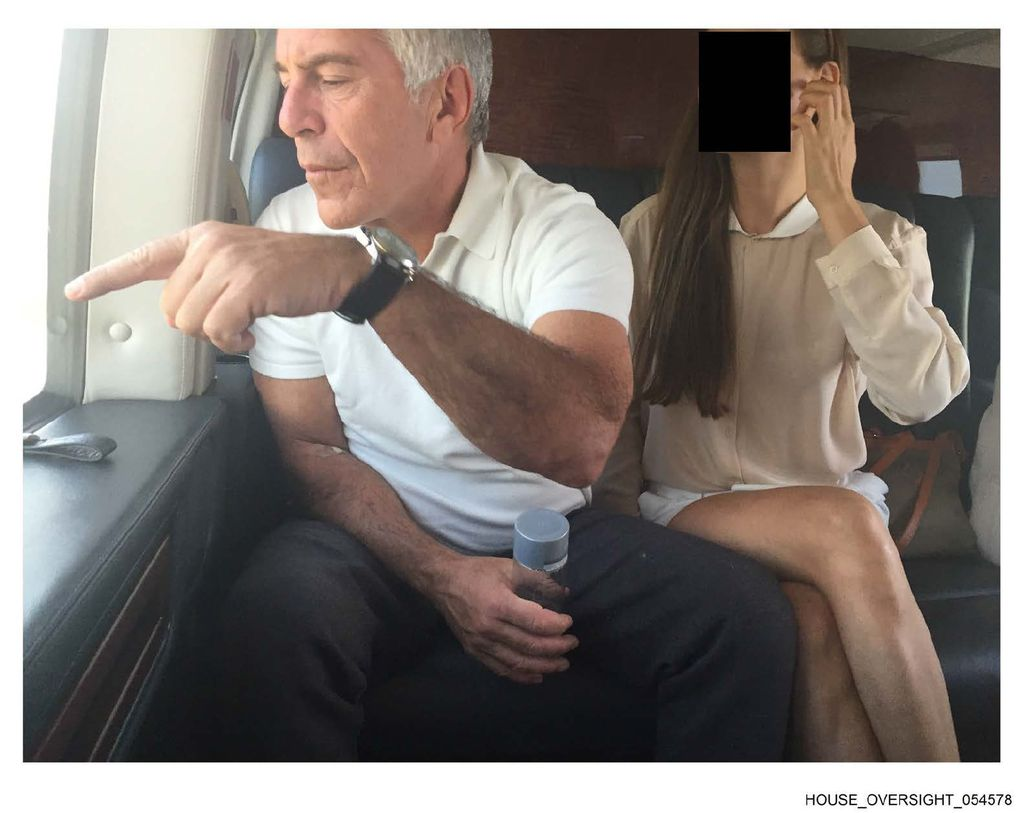 Jeffrey Epstein is pictured with an unidentified woman.