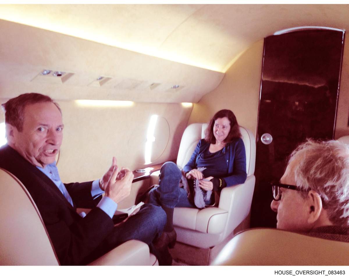 former Harvard President Larry Summers and Summers' wife.