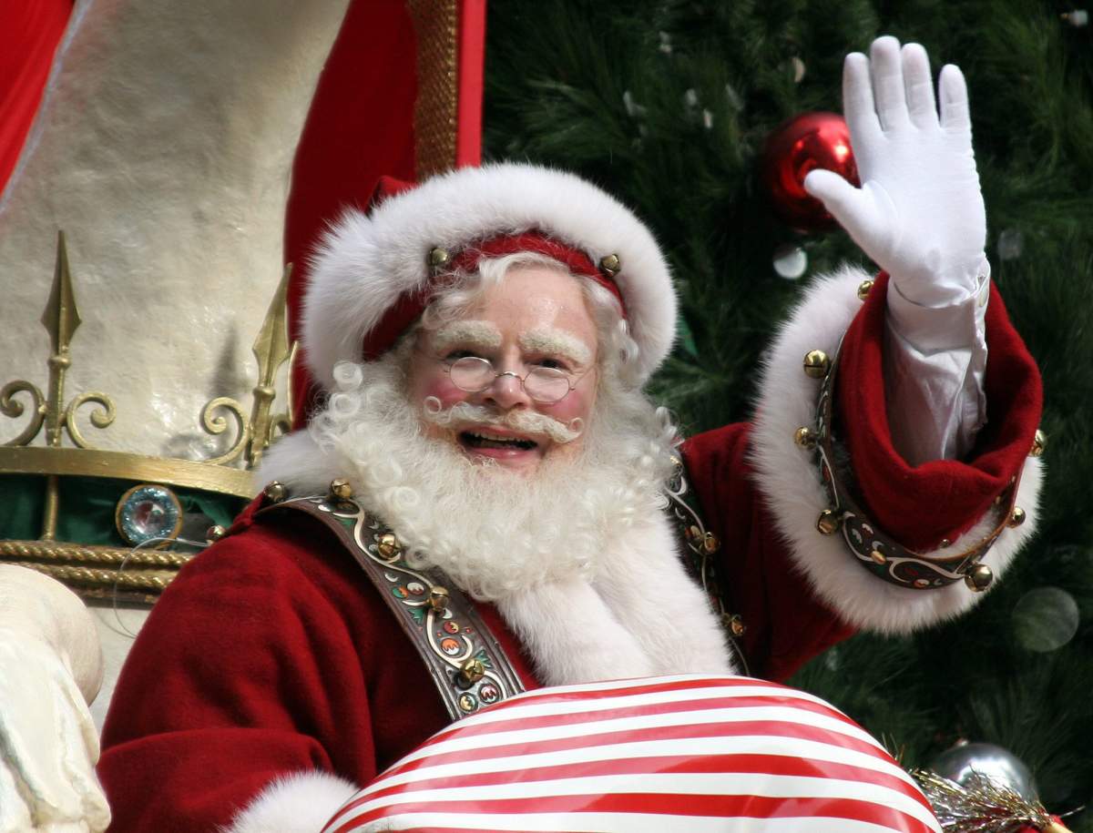Santa Claus waves from his sleigh as he makes his way down Broadway during the Macy's Thanksgiving Day parade in New York.
