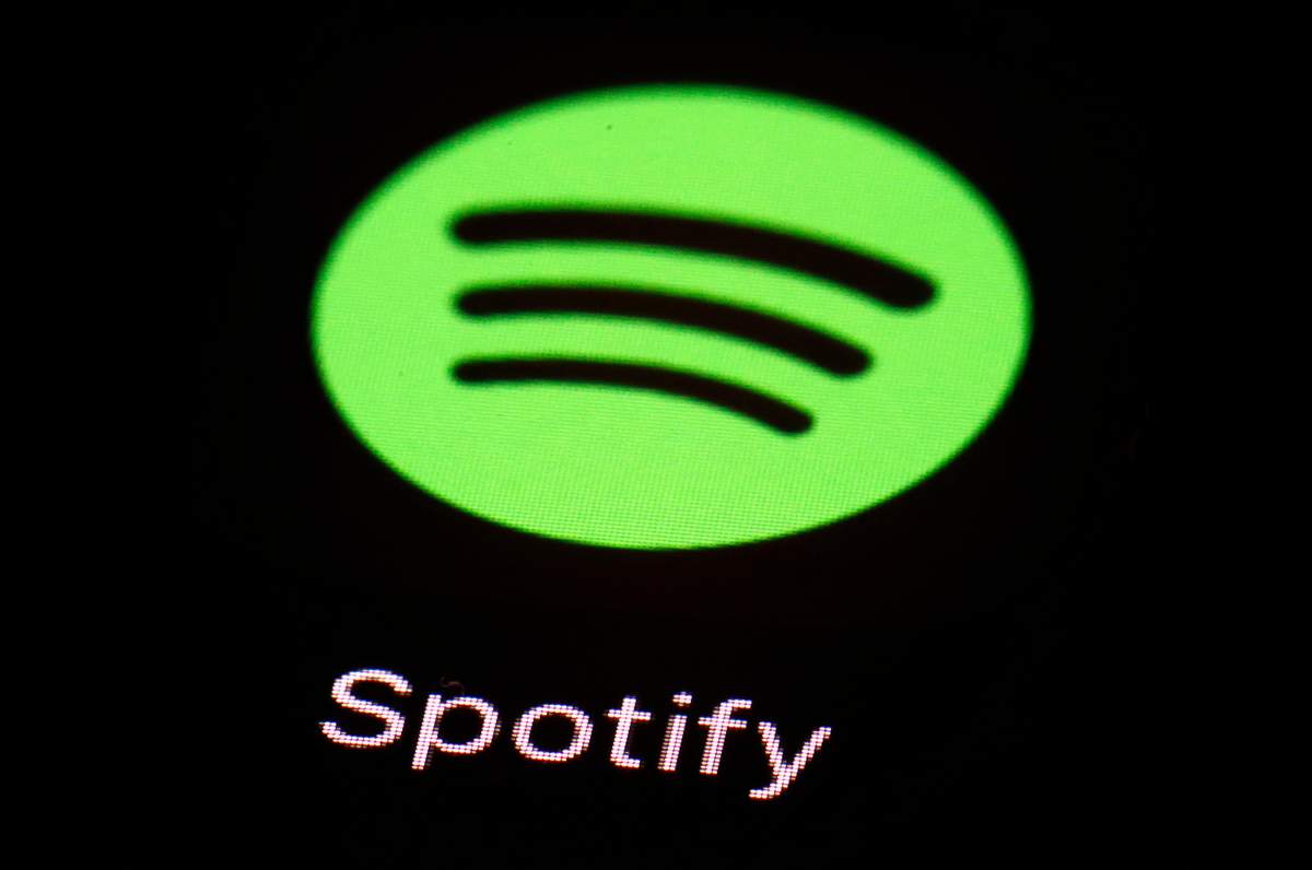 This March 20, 2018 file photo shows the Spotify app on an iPad in Baltimore.