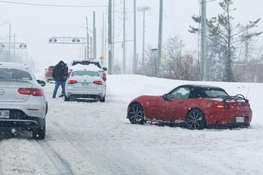 Drivers struggle to navigate Mapleview Drive in Barrie, Ontario on Friday Nov. 28, 2025. 