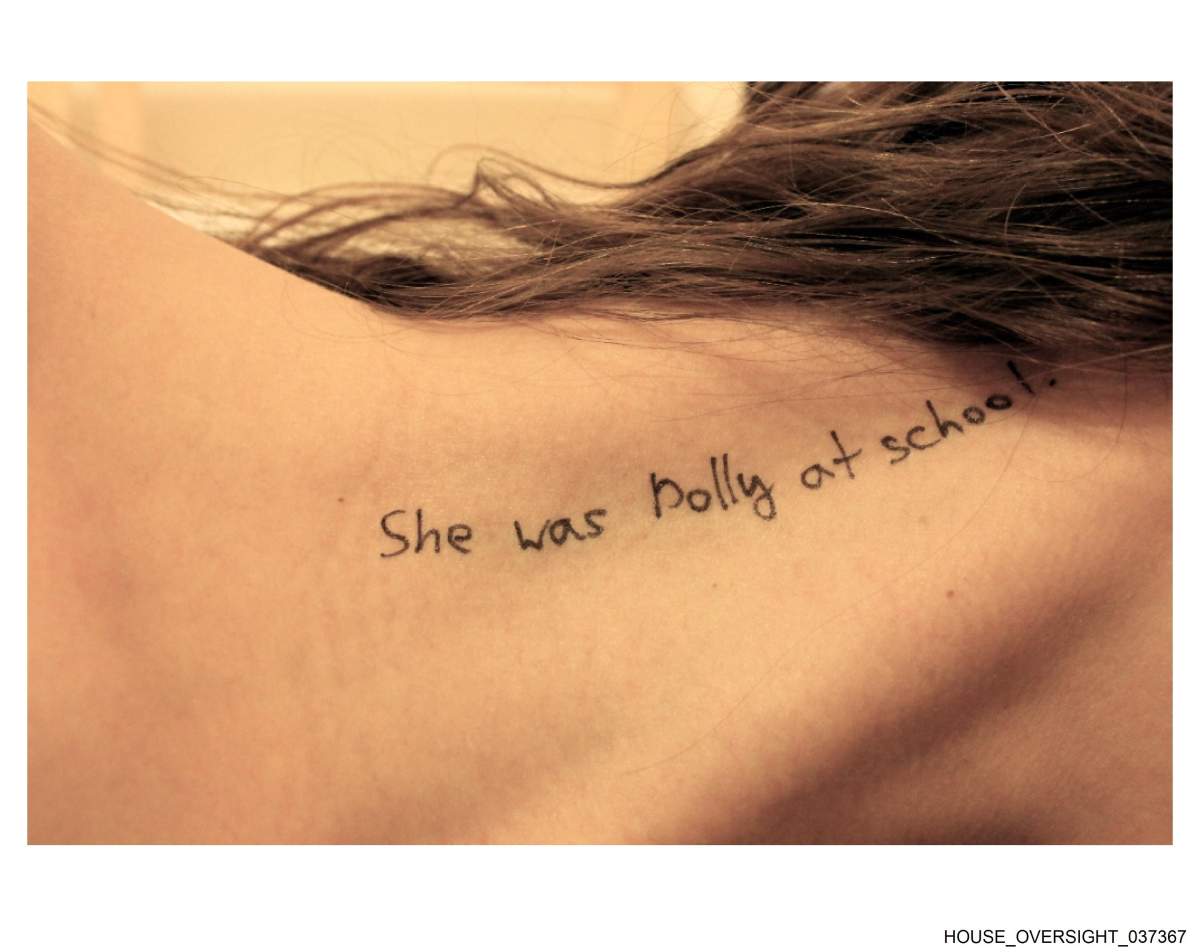 A message written on an unidentified person's body.