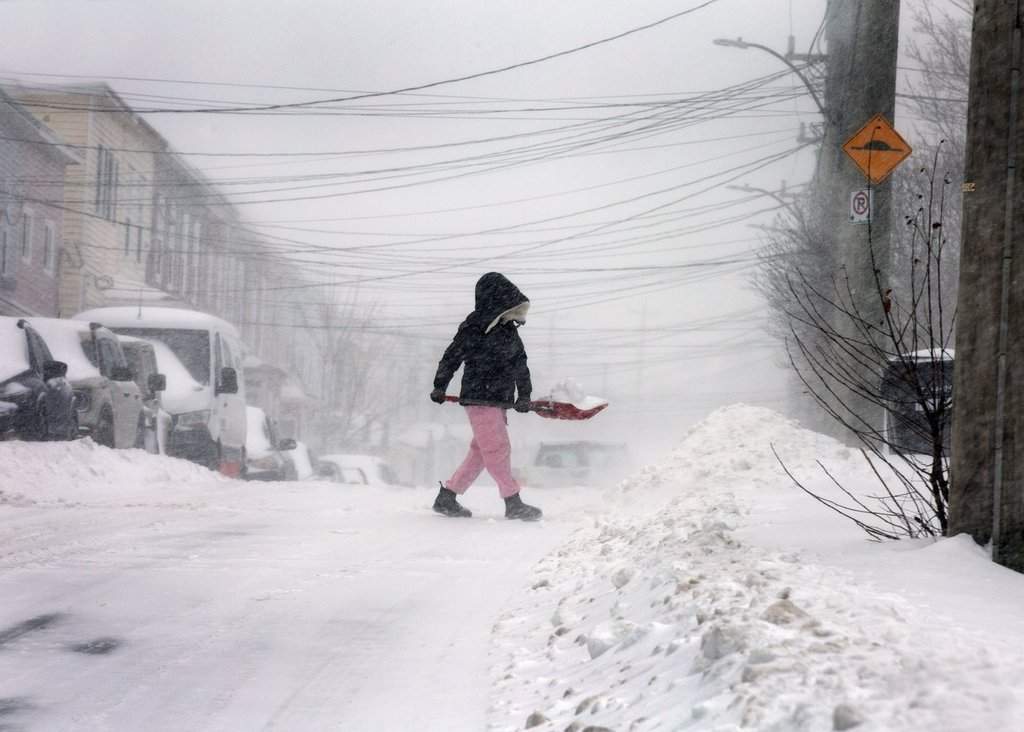 Freezing rain is set to hit parts of Ontario and Quebec as a powerful winter system brings blizzards, blowing snow and extreme cold to much of Canada.