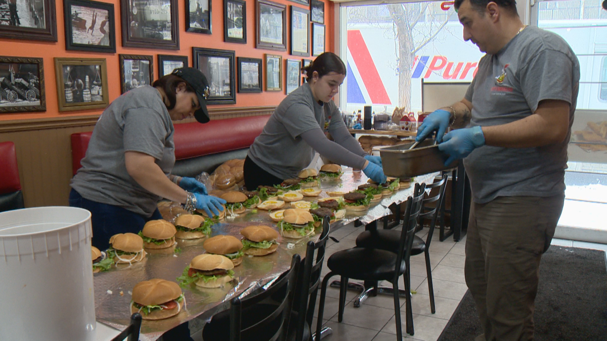 Workers busy making burgers