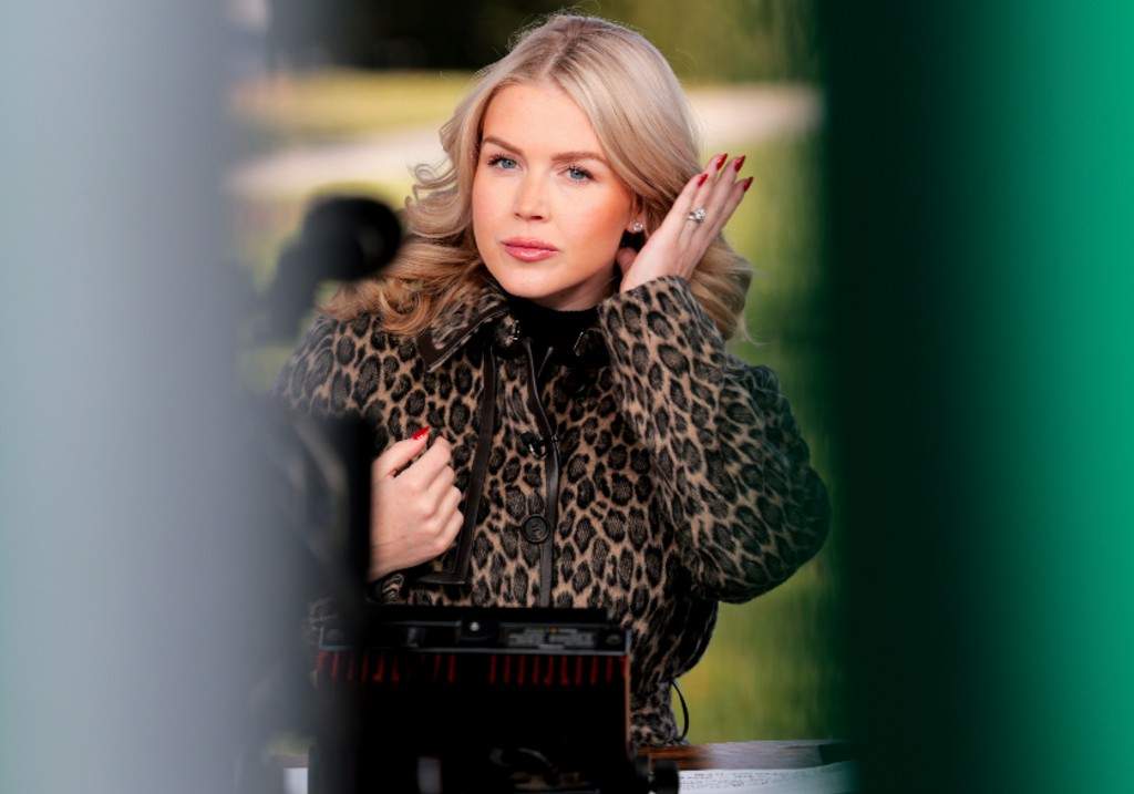 White House Press Secretary Karoline Leavitt participates in a television interview outside the White House on December 16, 2025 in Washington, DC.