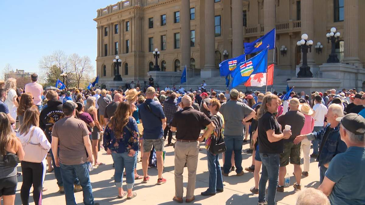 Supporters of Alberta's separation from Canada hold a rally in front of the Alberta legislature on Oct. 25, 2025.