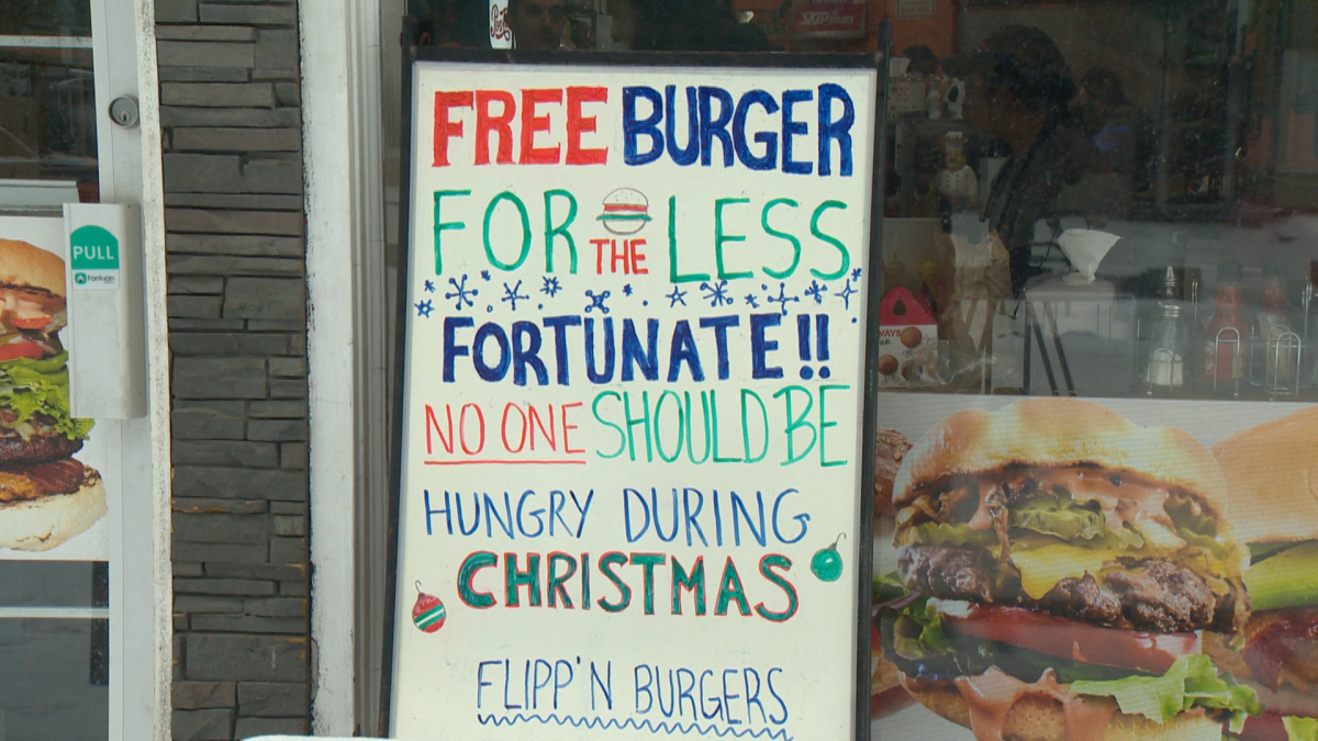 A sign advertises free burgers