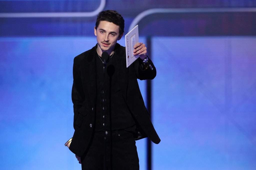 This image released by CBS Broadcasting shows Timothée Chalamet accepting the award for best actor in a motion picture - musical or comedy for "'Marty Supreme' during the 83rd Golden Globes on Sunday, Jan. 11, 2026, at the Beverly Hilton in Beverly Hills, Calif.