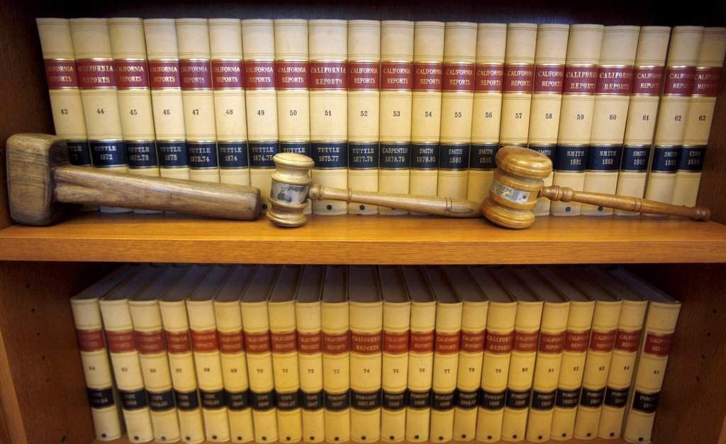 Gavels and law books are shown, July 14, 2010, in San Francisco. 